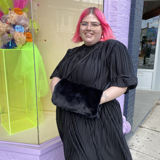 CLYDE Muff Bag in Black Faux Fur. Available at EASE Toronto.