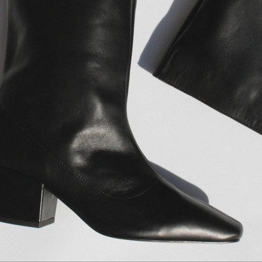About Arianne tall pull on boot with pointed toe and chunky heel