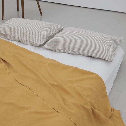 Deiji Studios Sheet in Mustard. Available at EASE Toronto.