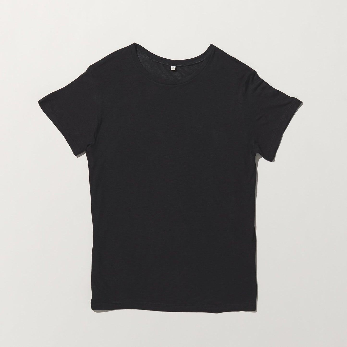 black t-shirt on white background