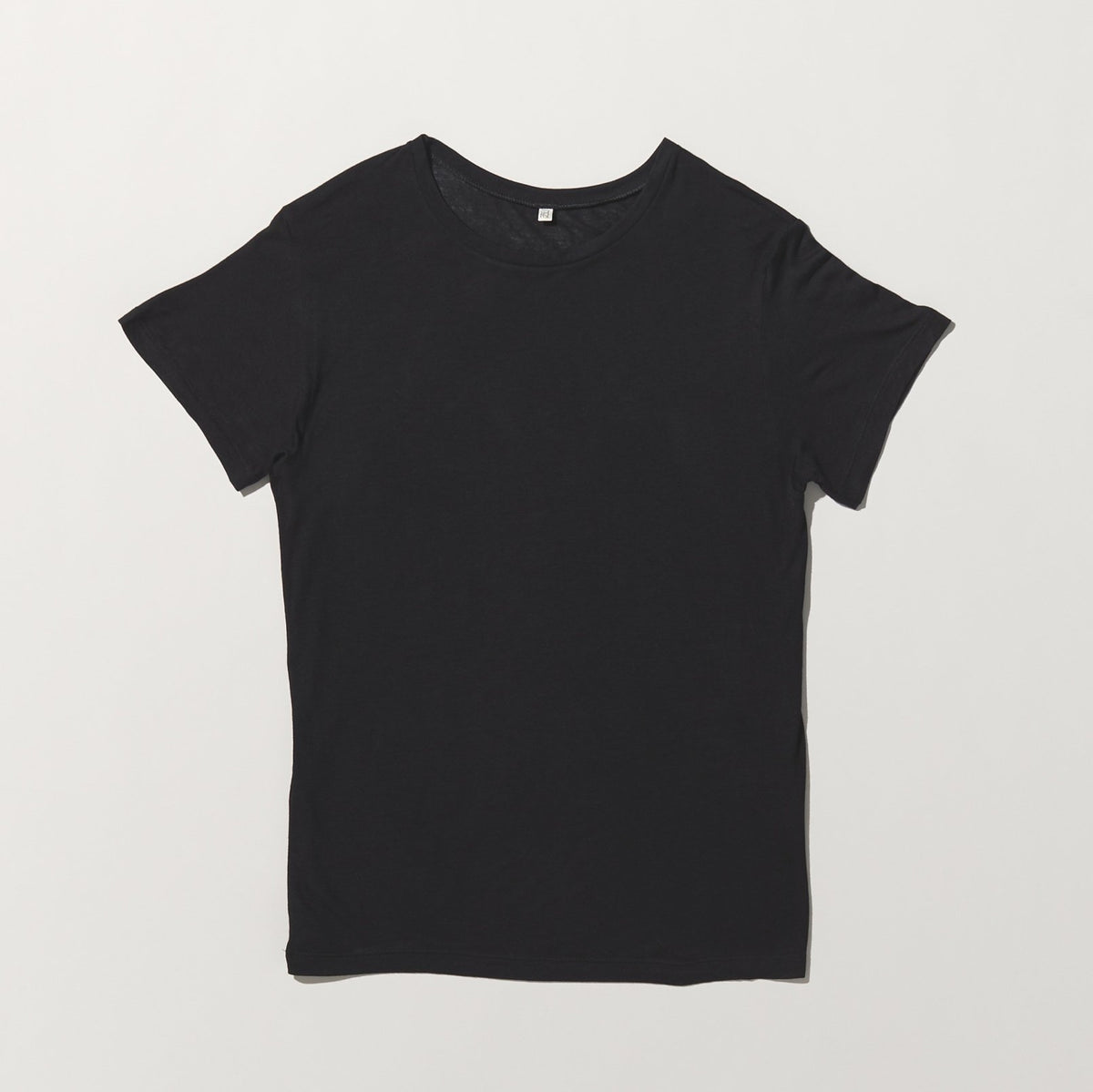 black t-shirt on white background