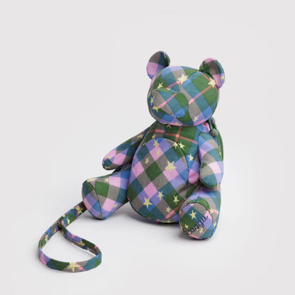Plaid patterned teddy bear with a strap on a white background