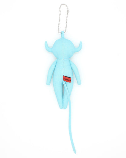 Blue plush toy devil charm with floral design eyes on a white background