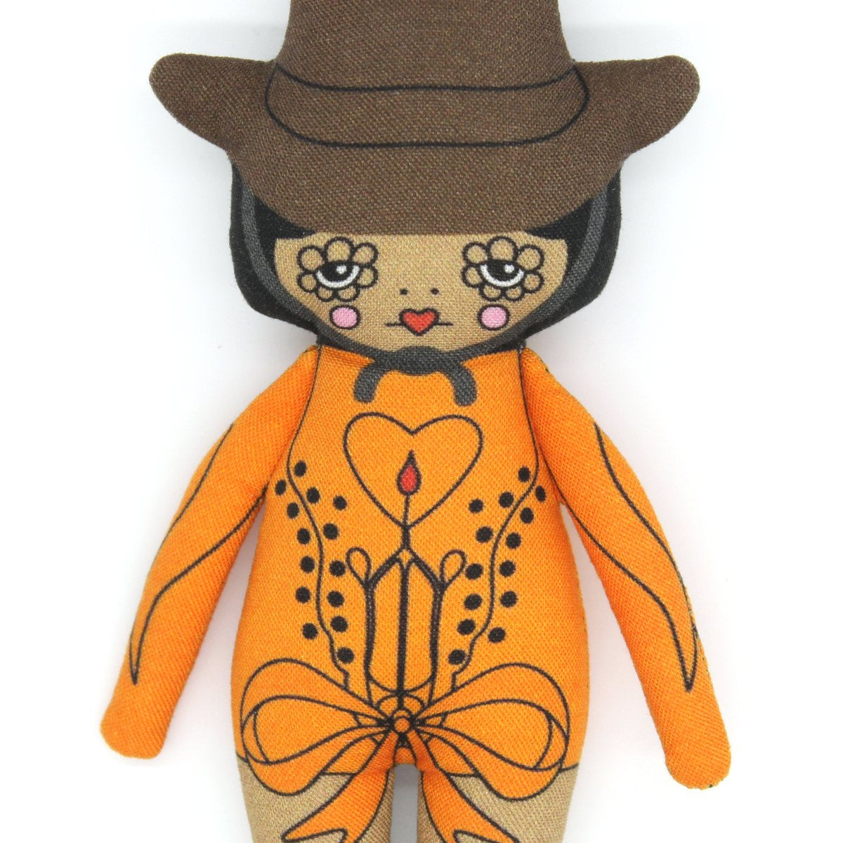 Plush toy with orange outfit and brown hat on a white background