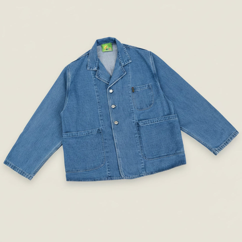 Blue denim jacket on a white background