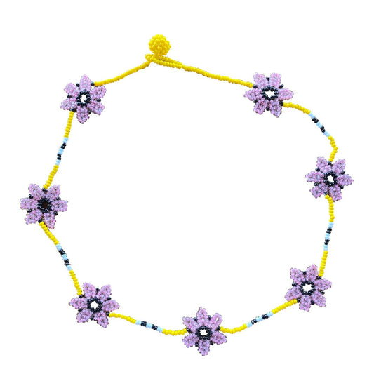 Fully beaded necklace with yellow beaded chain with light and dark blue accents and 7 lavender beaded flowers weaved throughout