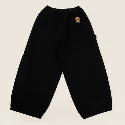 Black pants with a brand logo on a white background