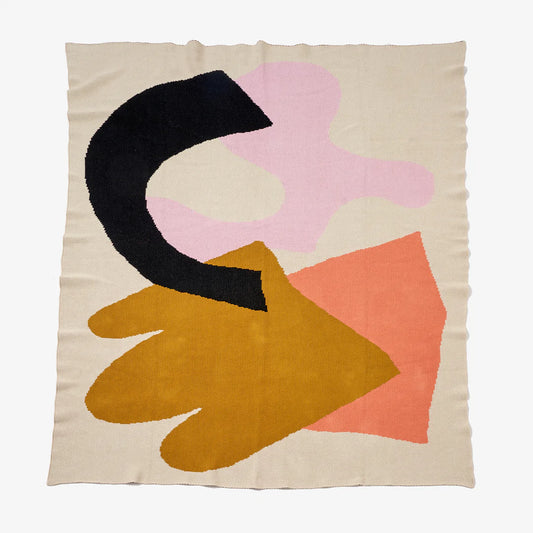 Reversible knit Assembly throw blanket with graphic shapes