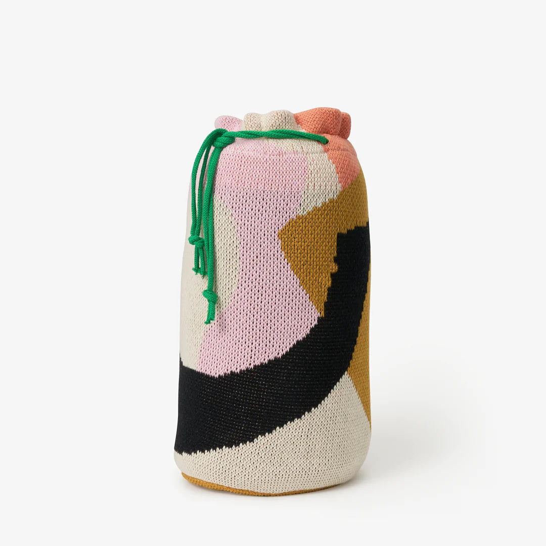 Reversible knit Assembly throw blanket with graphic shapes