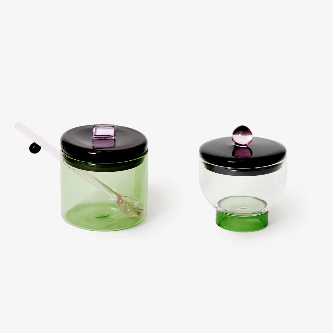 Areaware glass Salt Bowl with green base, clear body, and black and pink lid 