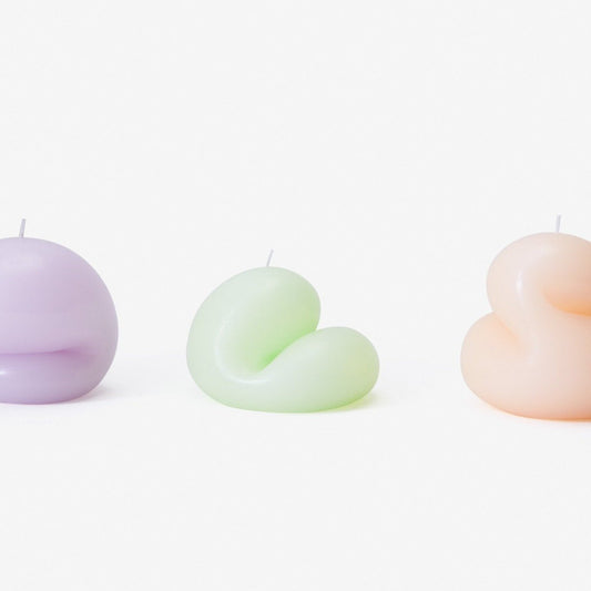 Areaware goober candle in blue with organic blobby shape and single wick